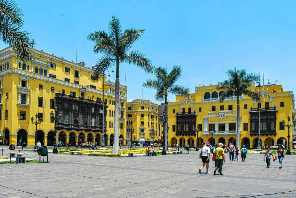 Colonial buildings at Lima’s Plaza Mayor on a sunny day