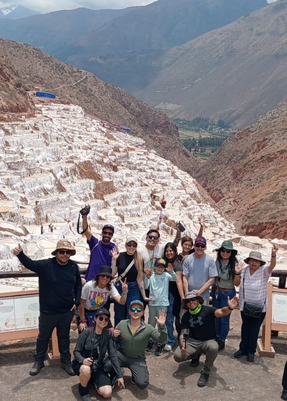 Group of tourists visiting the salt mines during the Maras and Moray tour in Cusco